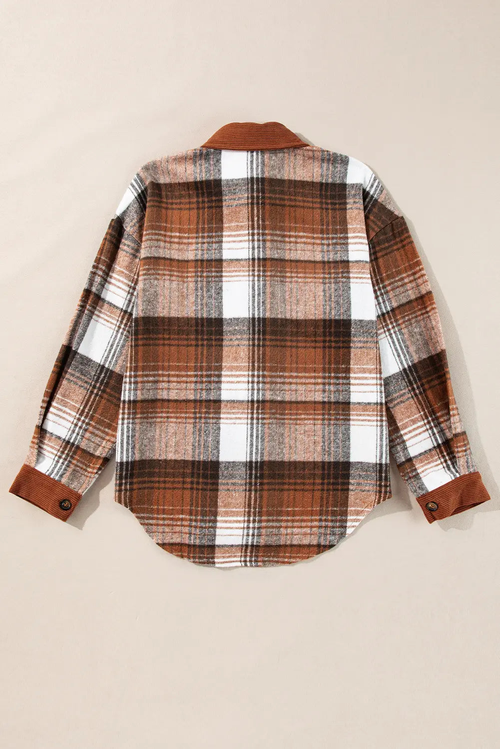 Plaid shirt with brown accents on a beige background