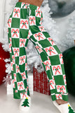 Green-white checkered candy cane pants with Christmas tree and gifts.