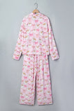 Pink long-sleeve pajama set with all-over cartoon cat print on hanger.
