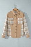 A long-sleeve button-up shirt hanging on a wooden hanger against a light gray wall. The shirt has a solid tan body with beige and white plaid patterned sleeves and matching plaid chest pockets.