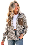 Woman wearing a plaid shirt with brown pocket flaps on a white background