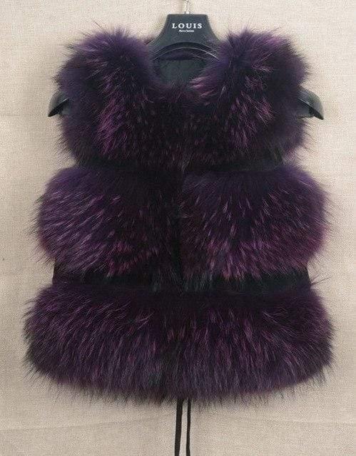 Purple fur vest on a hanger with 'LOUIS' branding in the background.