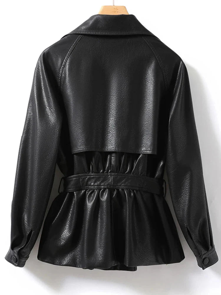 Black leather jacket on a mannequin against a white background