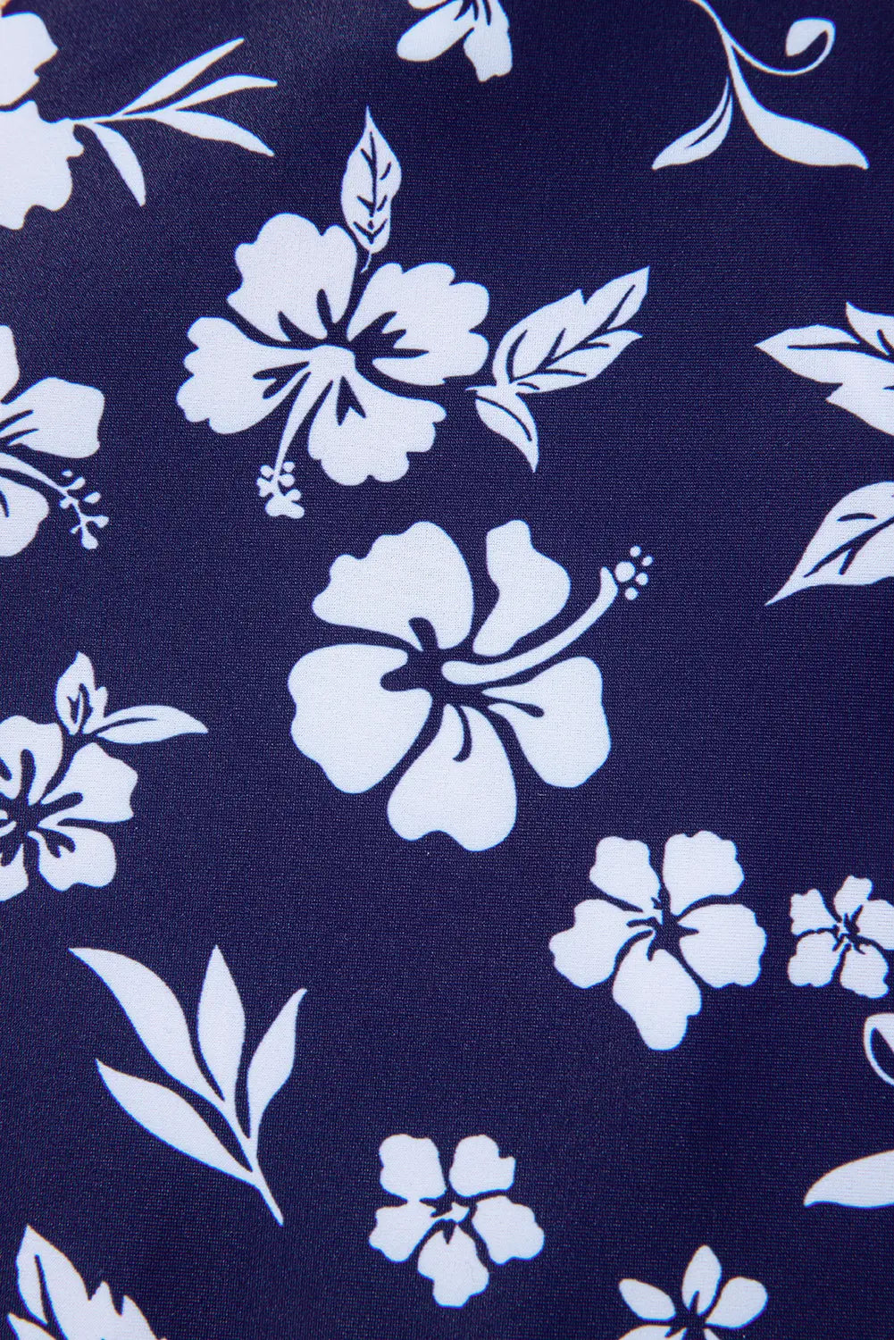 White floral pattern on a navy blue background