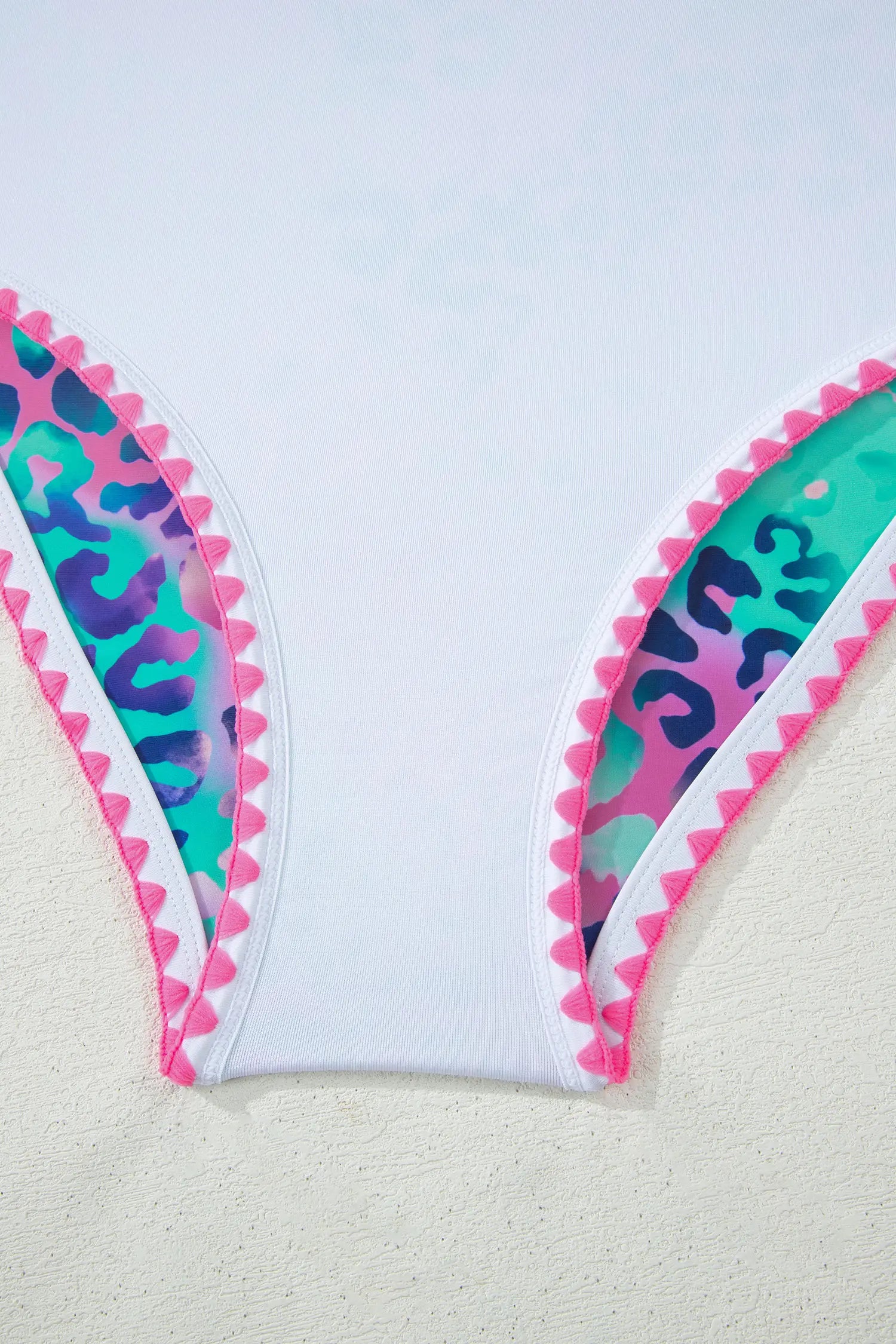 Colorful shark fin-shaped headband on a light background