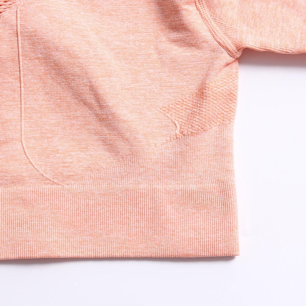 Close-up of a pink textured fabric on a white background