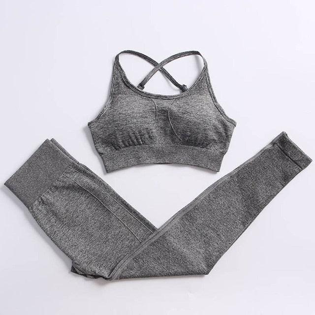 Gray sports bra and leggings set on a white background