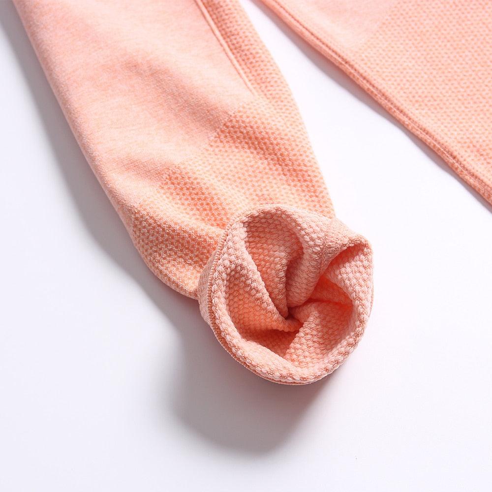 Close-up of a pink textured sock on a white background