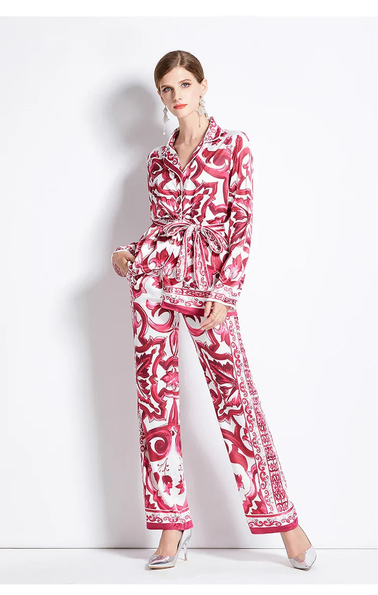 Woman wearing a red and white patterned outfit on a white background