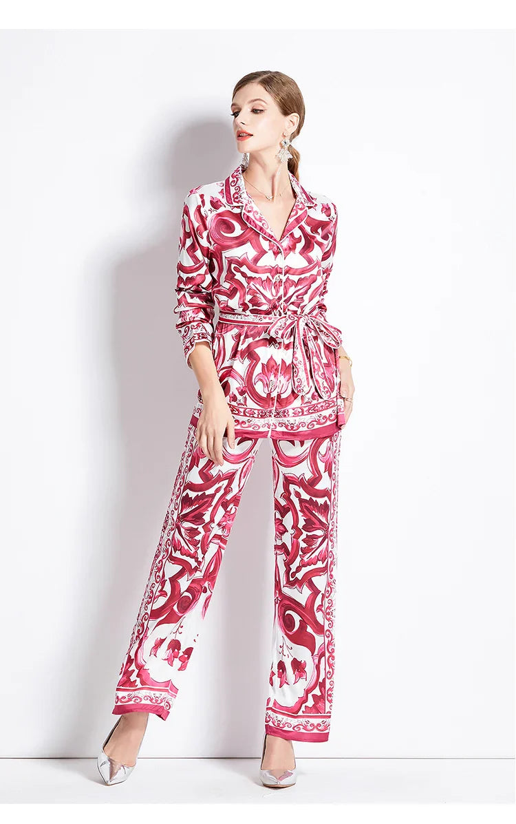 Woman wearing a red and white patterned outfit on a white background