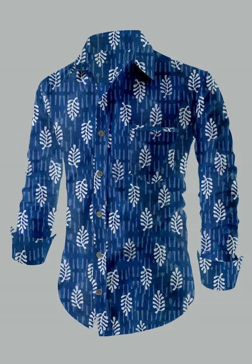 Blue shirt with white leaf pattern on a gray background