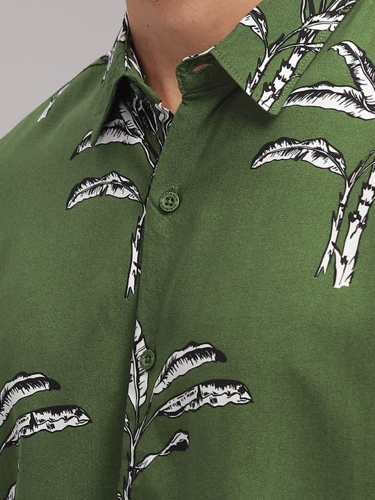 Green shirt with black palm tree pattern
