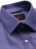 Close-up of a blue dress shirt with a visible Raymond label.