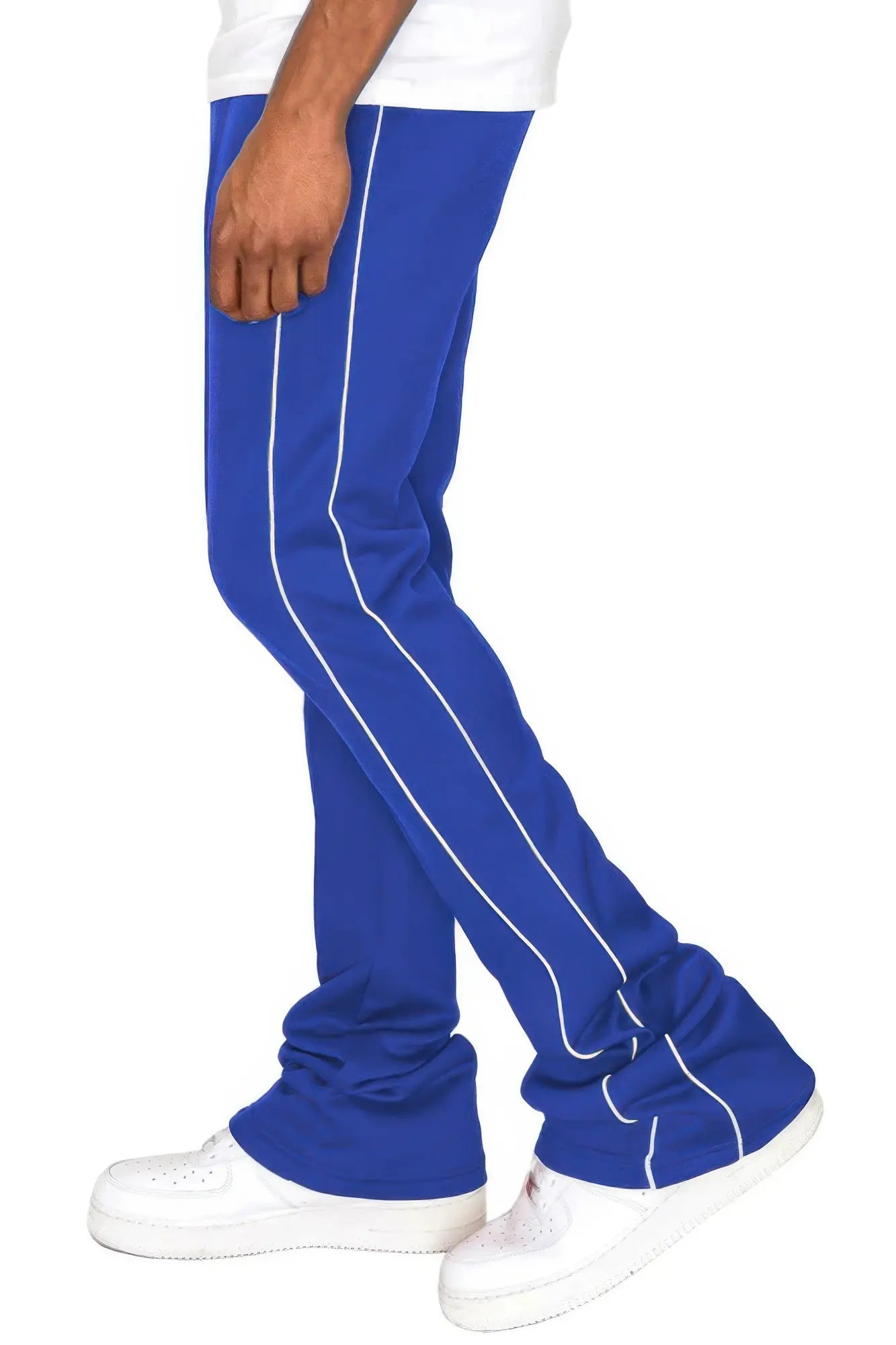 Blue pants with white stripes worn by a person on a white background