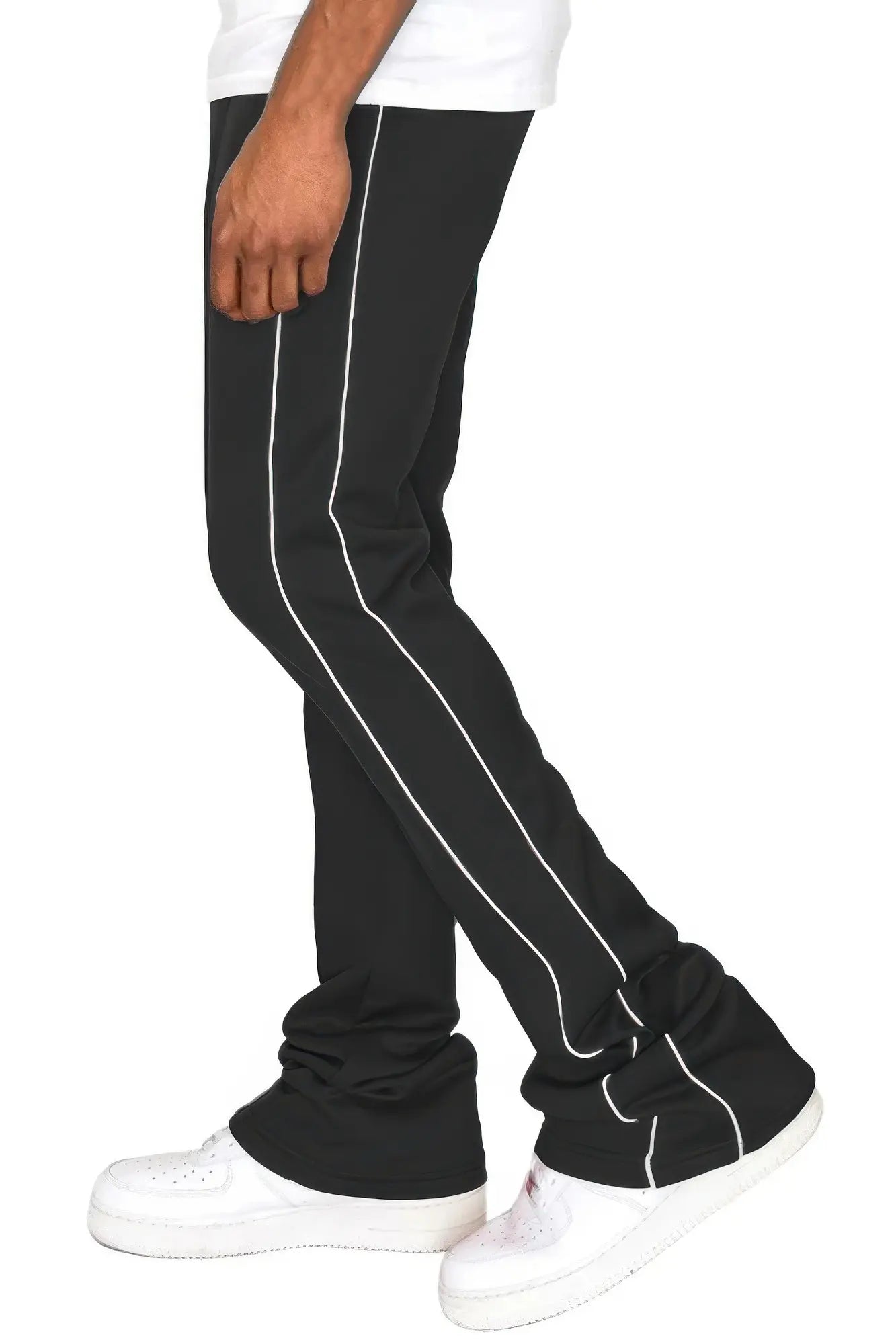 Black pants with white stripes worn by a person on a white background