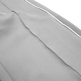 Close-up of gray fabric with a white line on a white background