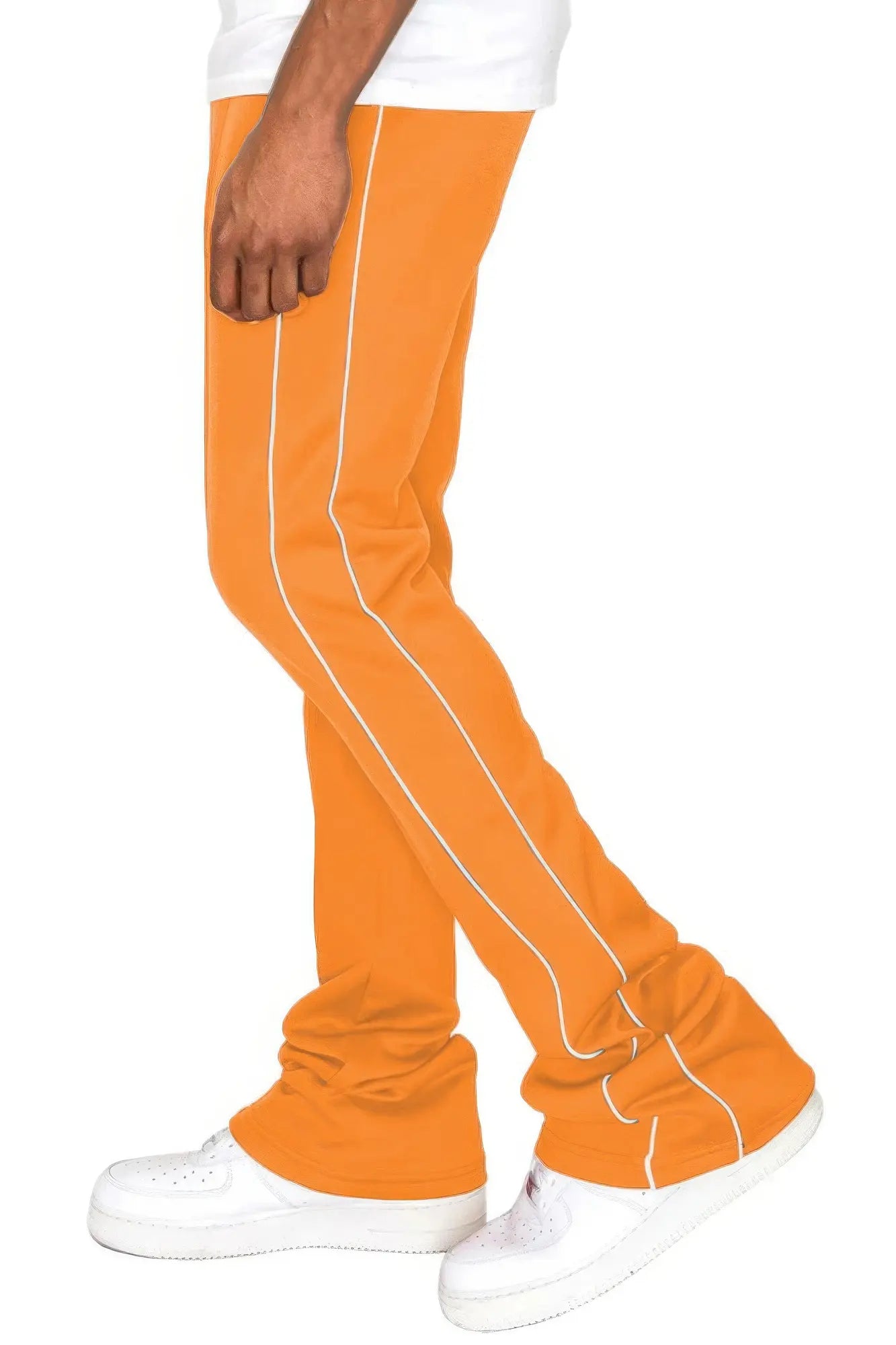 Orange pants with white stripes worn by a person on a white background