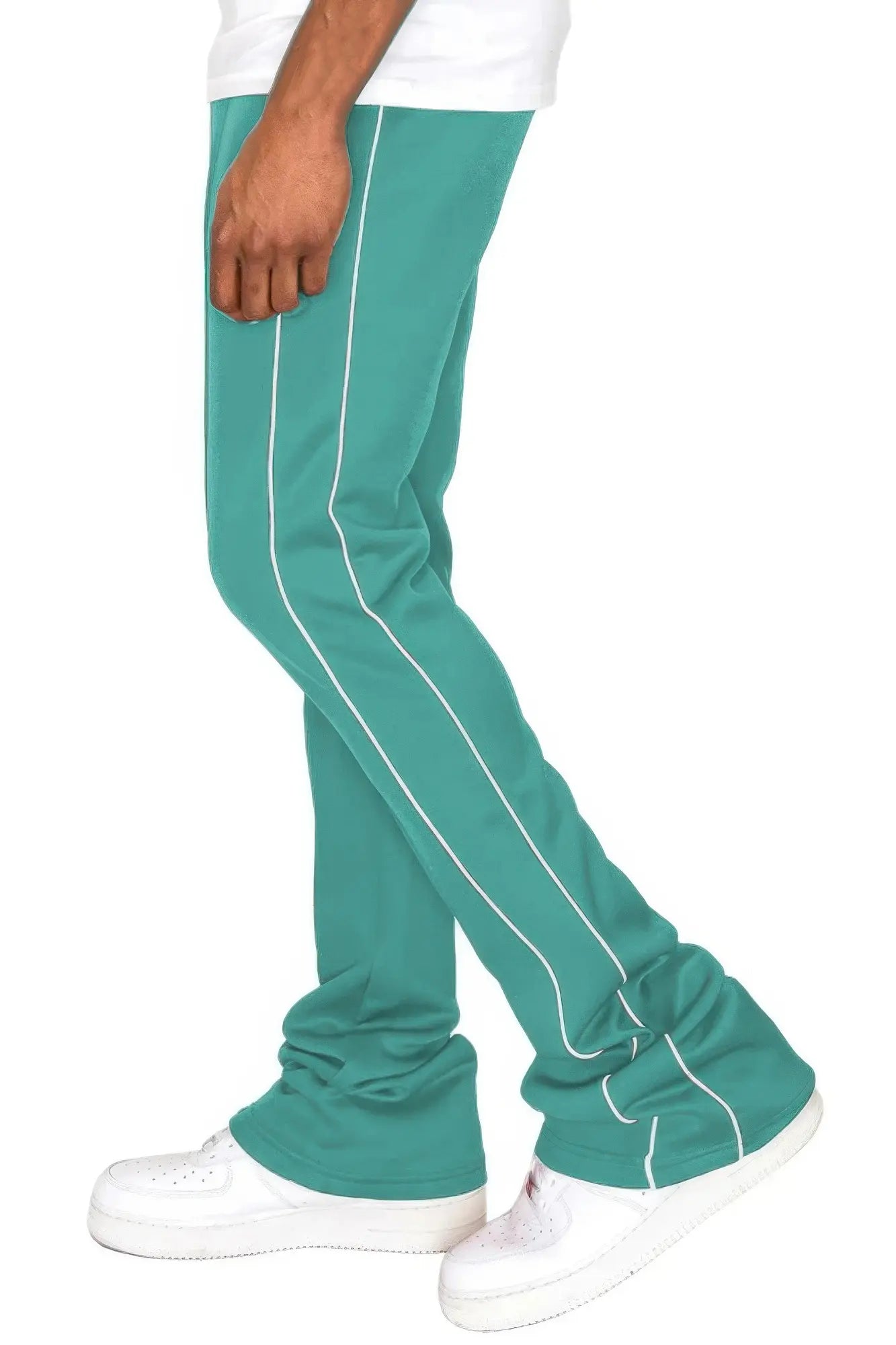 Teal pants with white stripes worn by a person on a white background