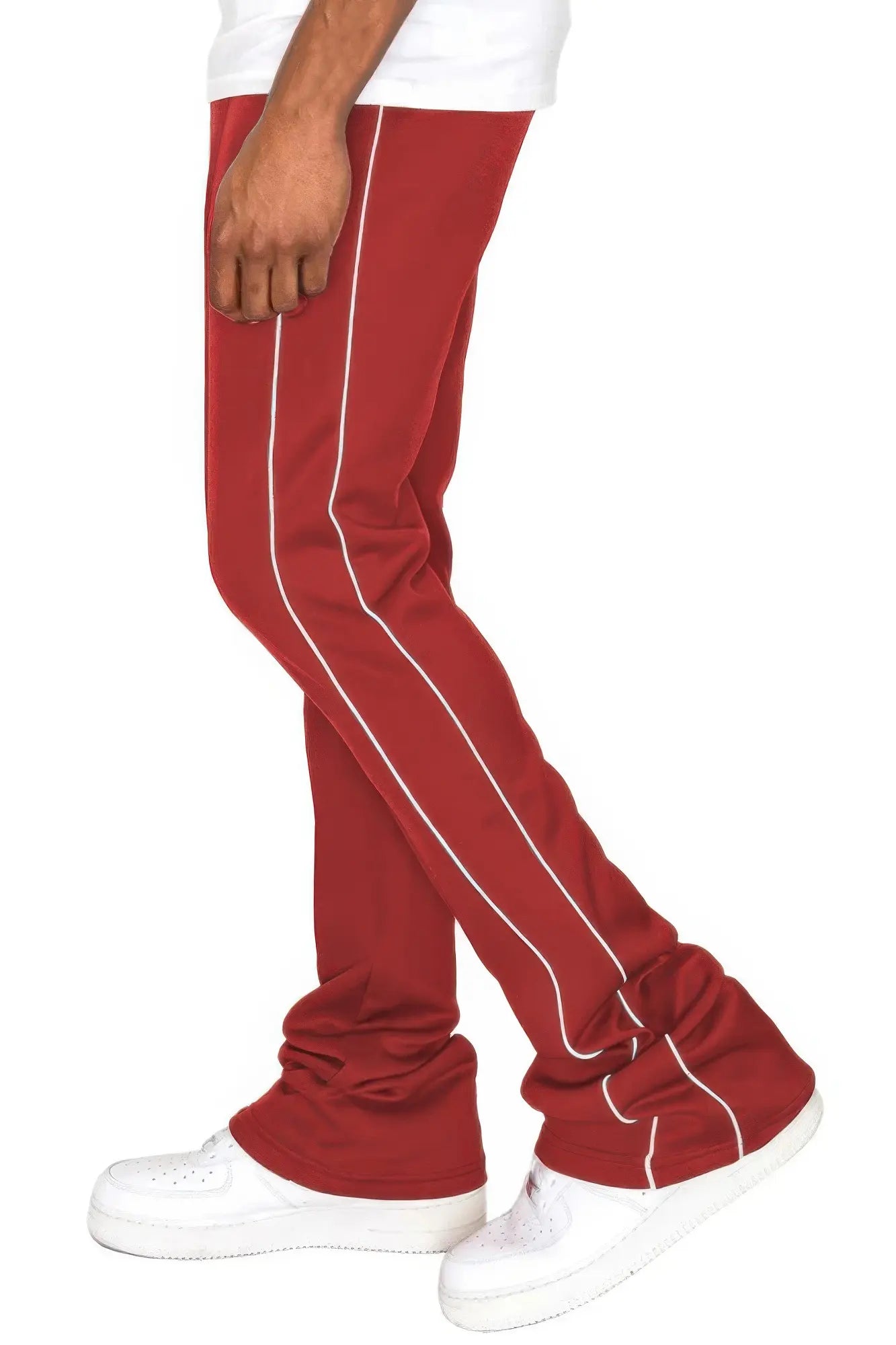 Red pants with white stripes worn by a person on a white background
