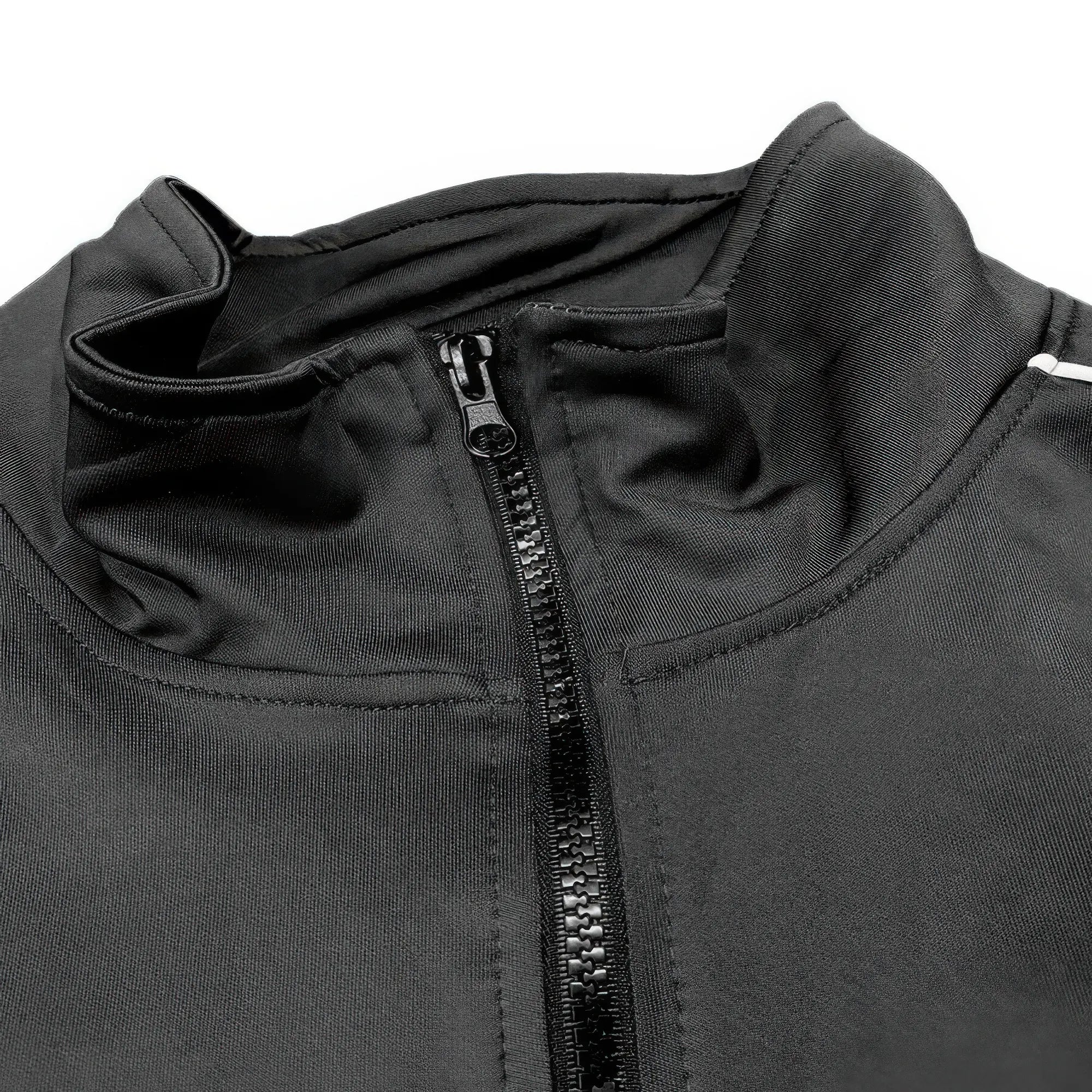 Close-up of a black jacket with a zipper on a white background