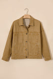 Tan corduroy utility jacket with pointed collar, button front, and two flap pockets on hanger.