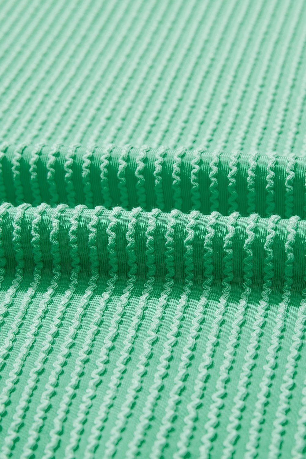 Close-up of green textured fabric