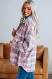 Woman wearing a plaid shirt in a living room setting
