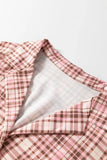 Pink, white, and brown plaid garment with gray lining.