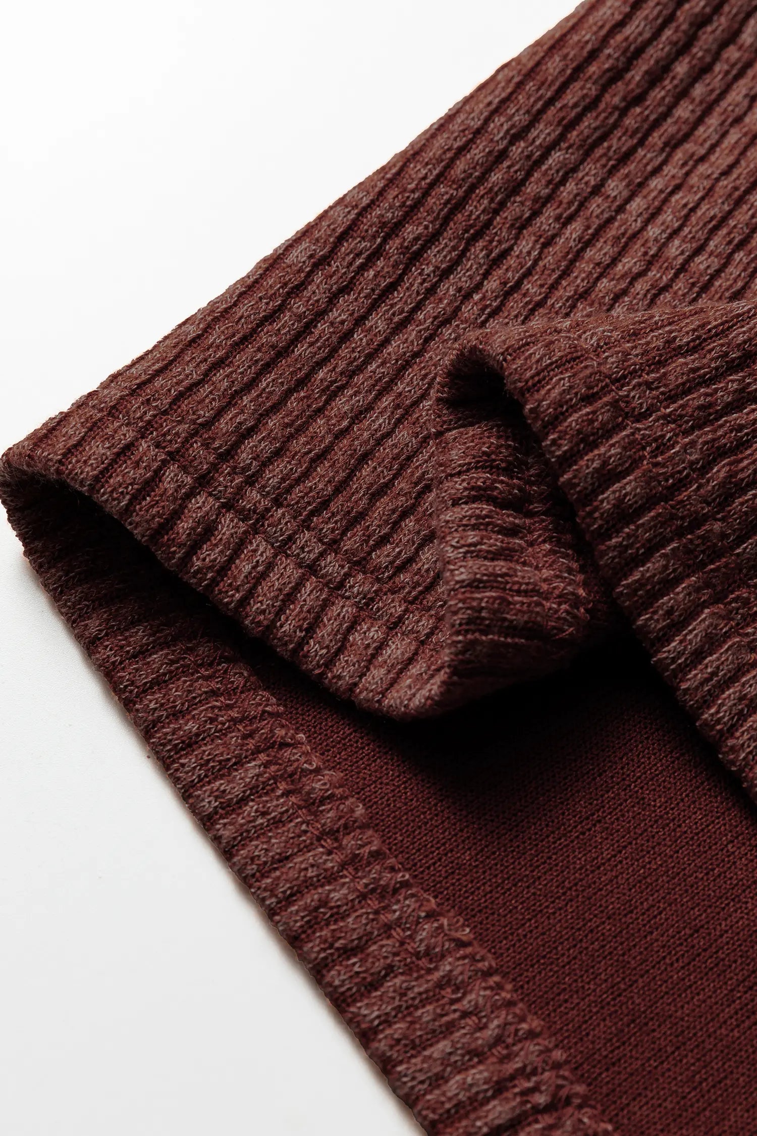 Brown ribbed fabric on a white background