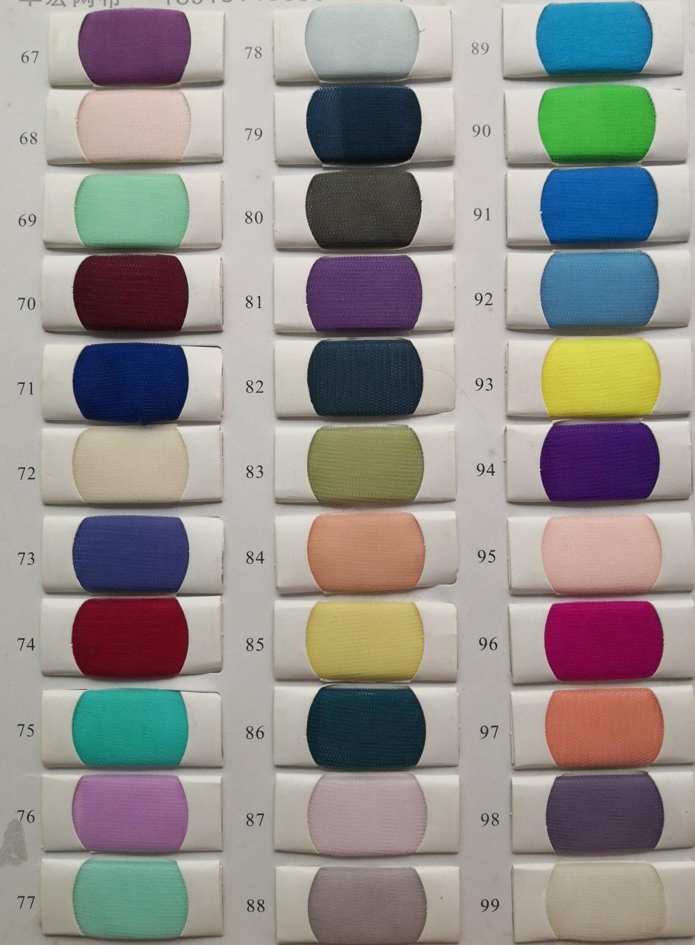 Color swatch chart with various fabric colors on a white background