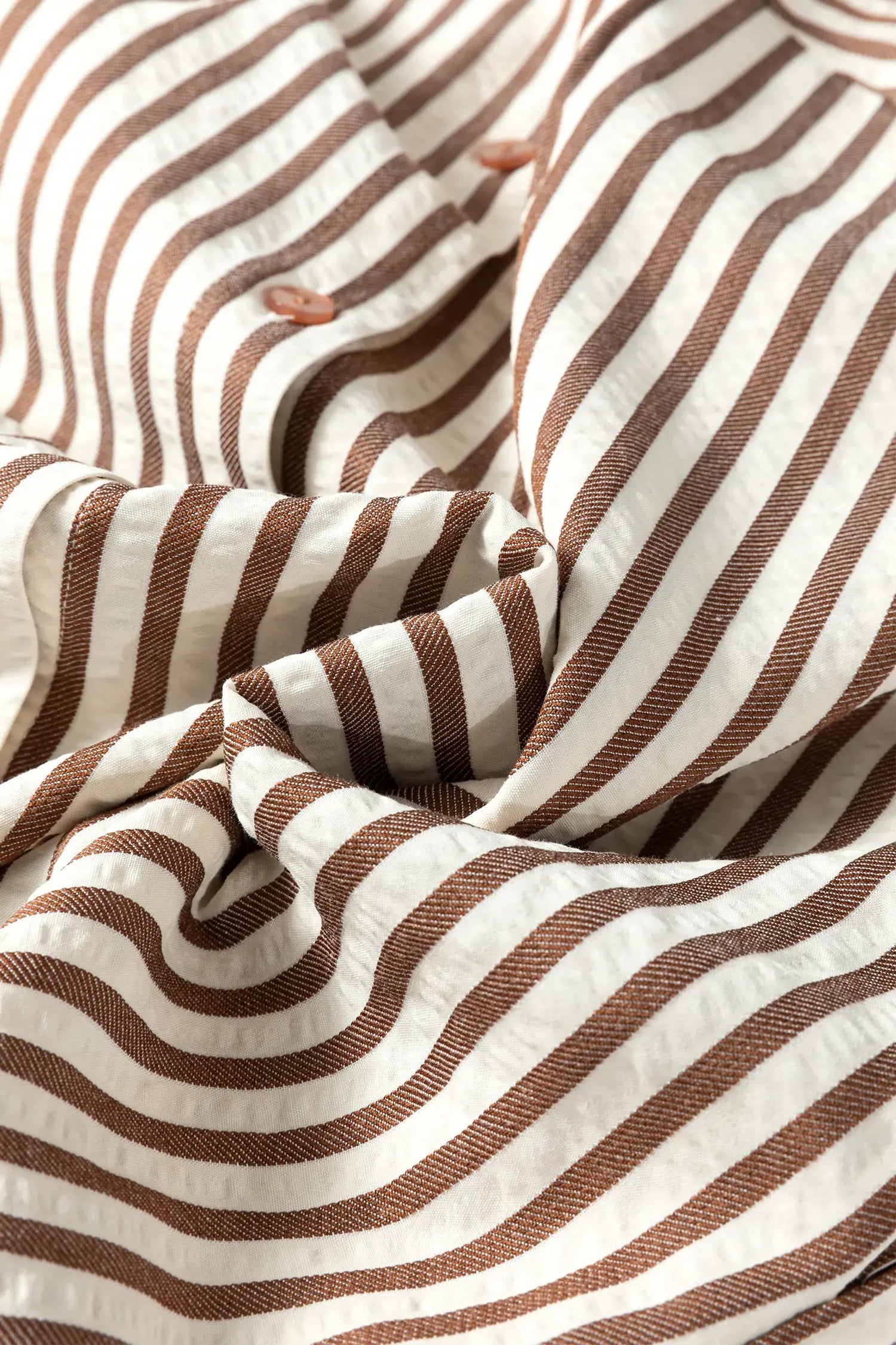 Close-up of brown and white striped fabric