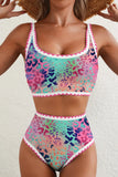 Multicolored leopard print bikini set on a plain background
