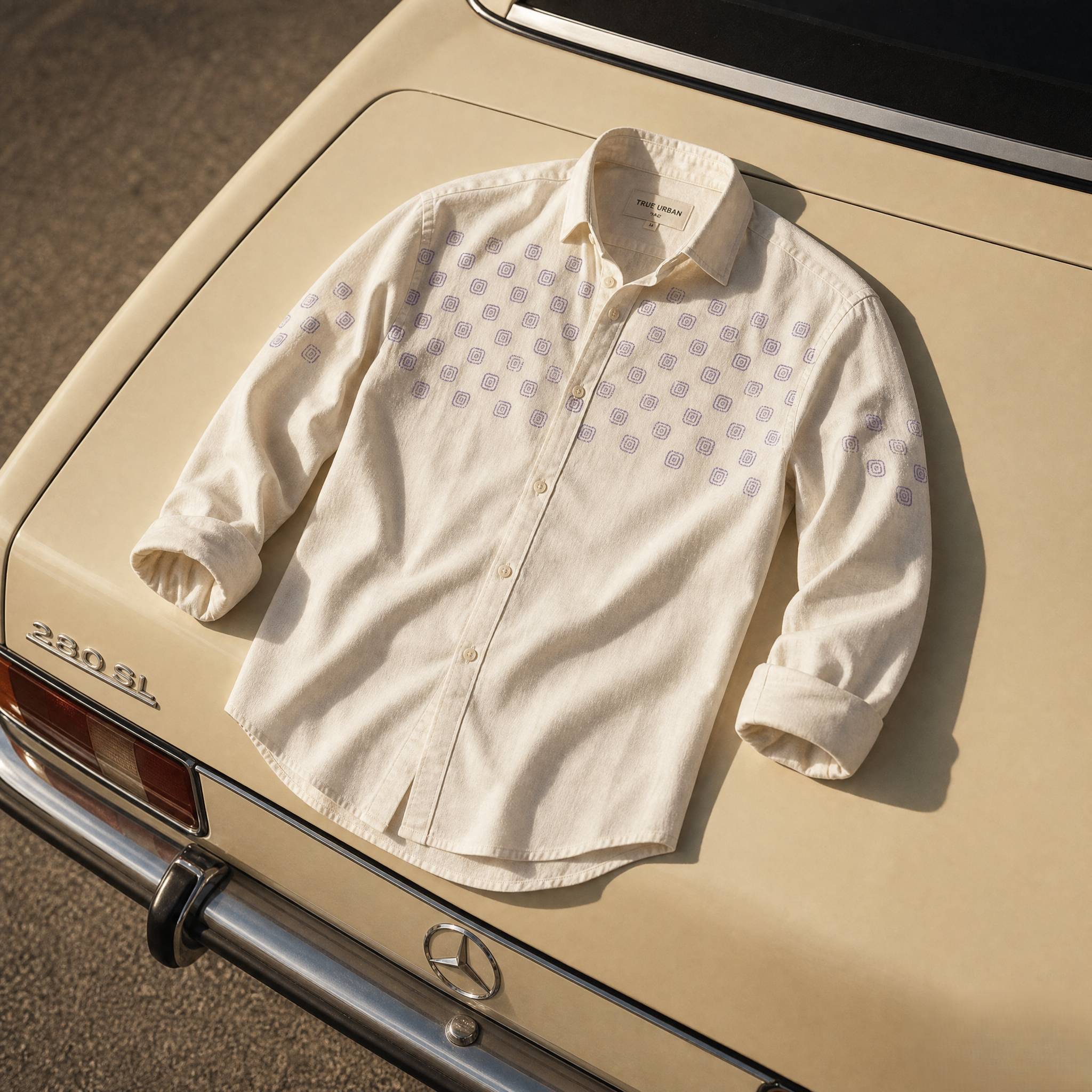 White shirt with purple pattern on a vintage car