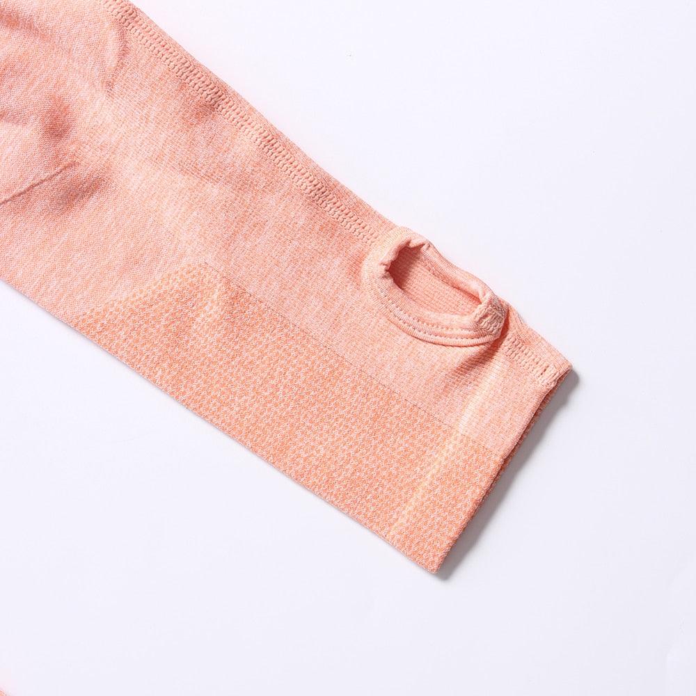 Close-up of a pink textured sleeve on a light gray background