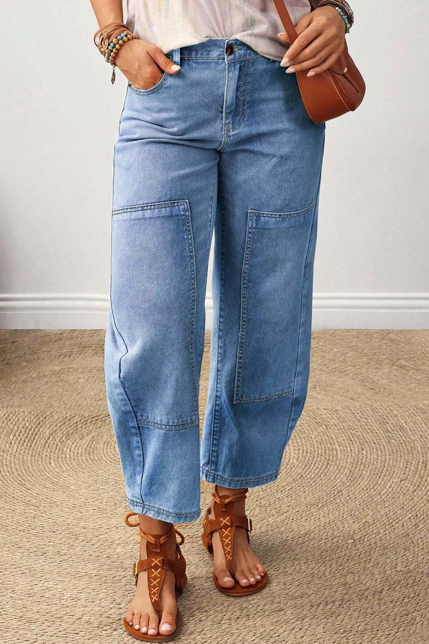 Beau blue barrel leg patchwork jeans with lace-up sandals, front view