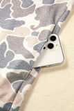 Hem detail on the beige camo print sweatshirt dress