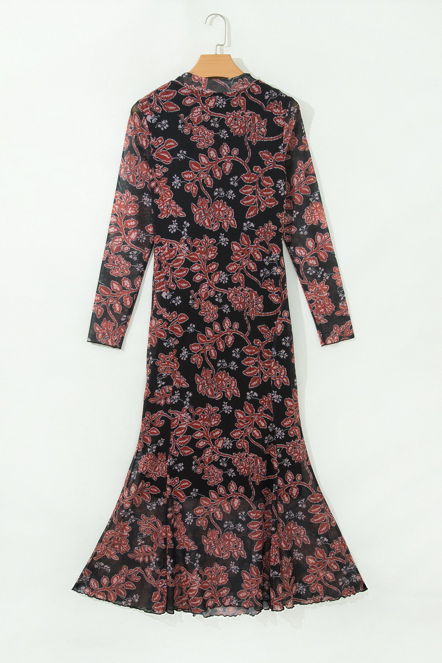 Black floral mesh long sleeve maxi dress on a hanger, back view