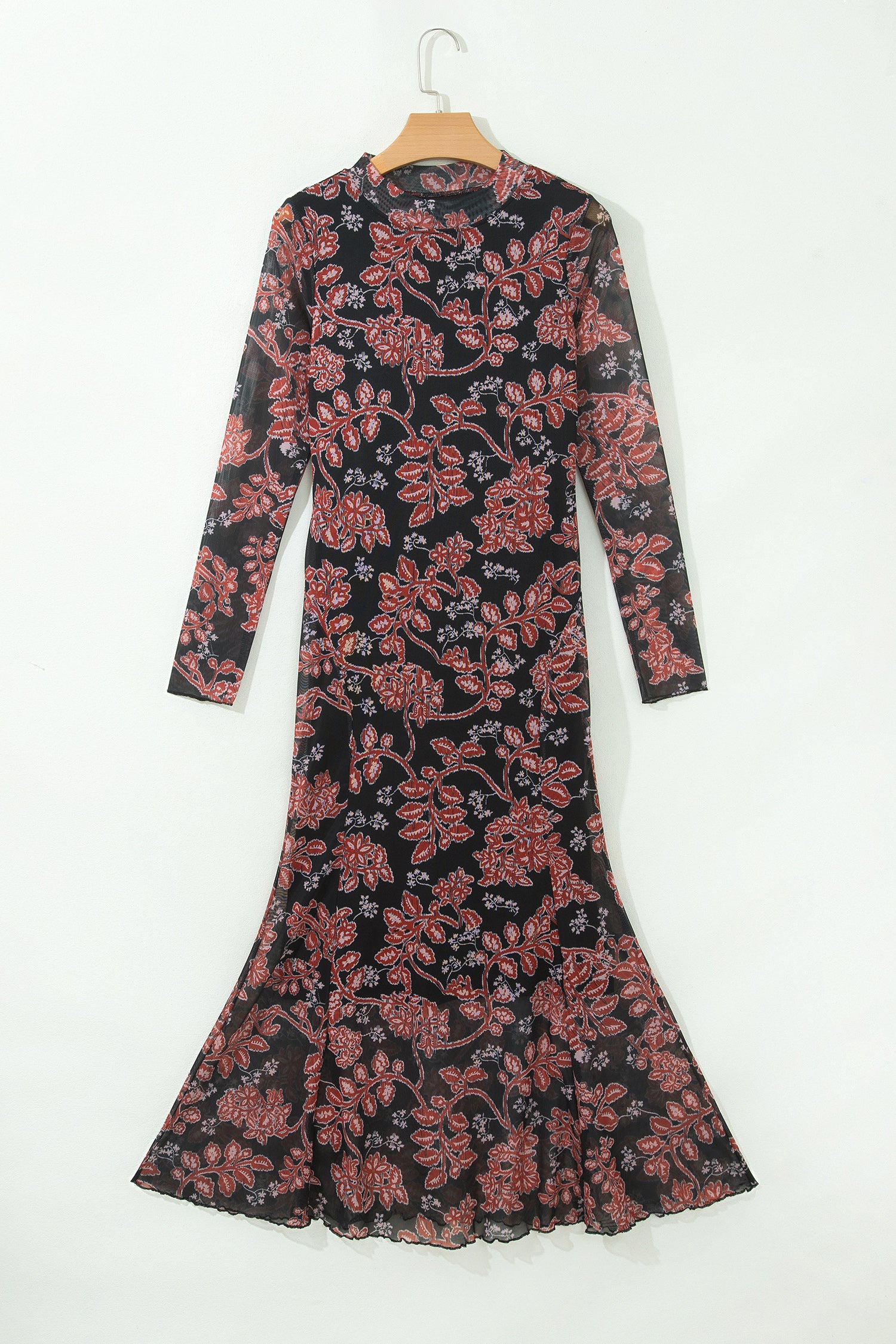 Black floral mesh mock neck maxi dress with flared hem on a hanger, front view