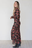 Side view of black retro floral mesh maxi dress with mermaid hem