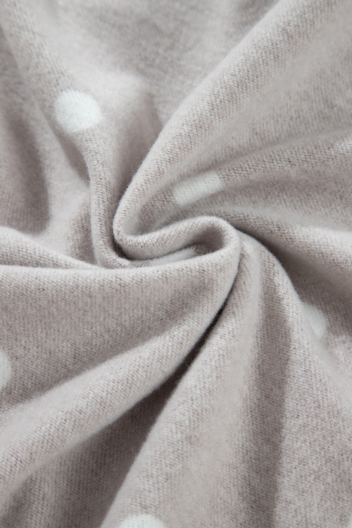 Soft inner fabric of brown polka dot lounge set, close-up