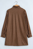 Back view of brown polka dot long sleeve shift dress with ruffle collar