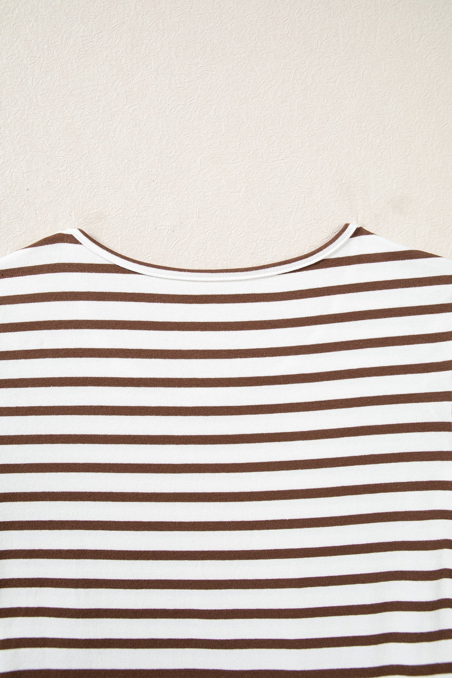 Back neckline of the striped ribbed knit bodice