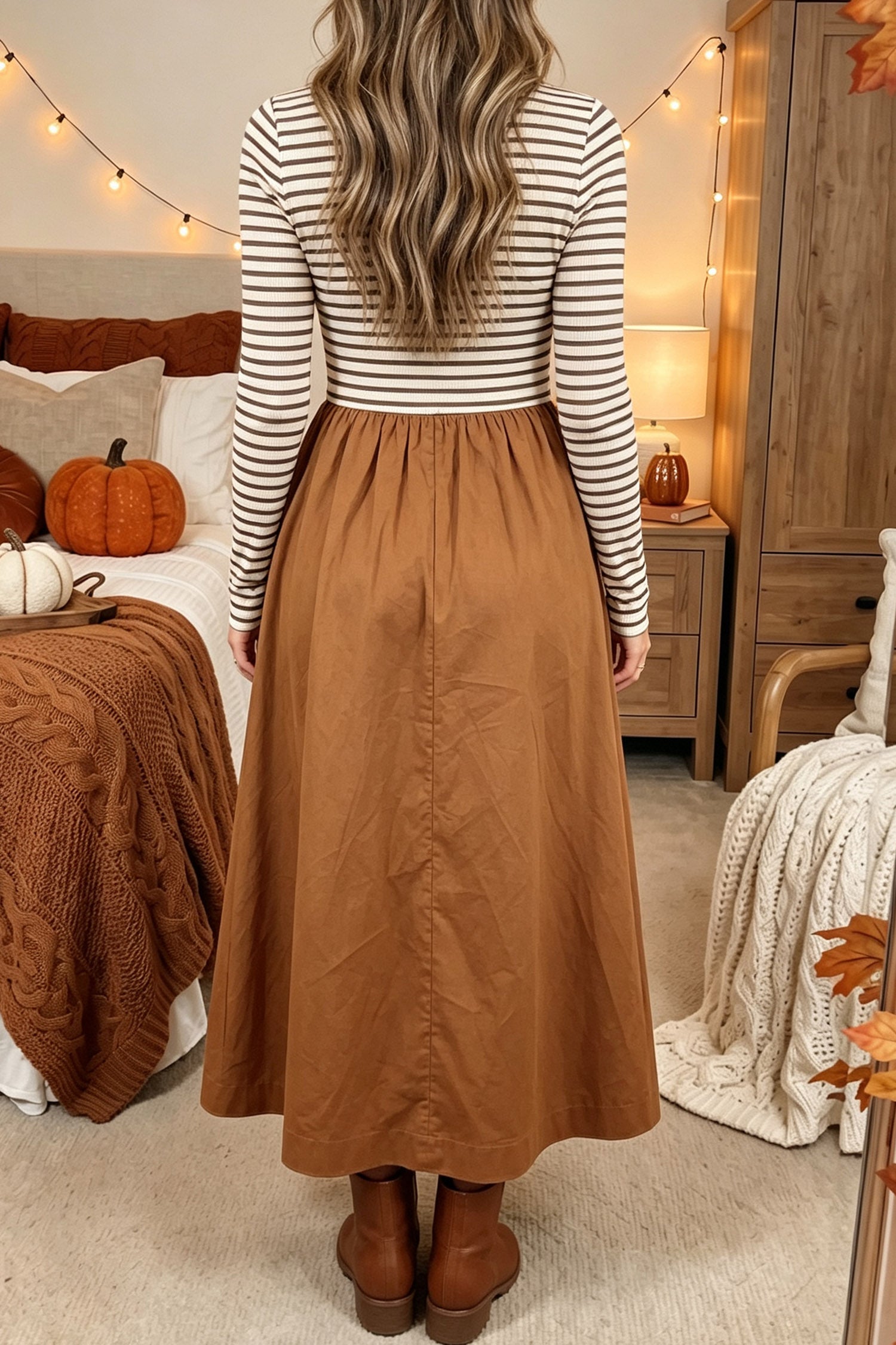 Back view of a striped bodice brown flared maxi dress