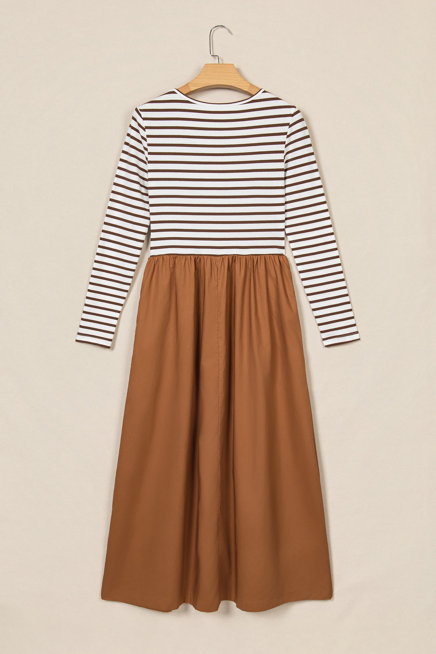 Brown stripe ribbed knit bodice maxi dress on a hanger, back view