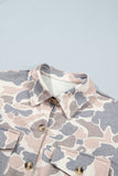 Camo shacket shirt collar, button front and chest flap pockets detail