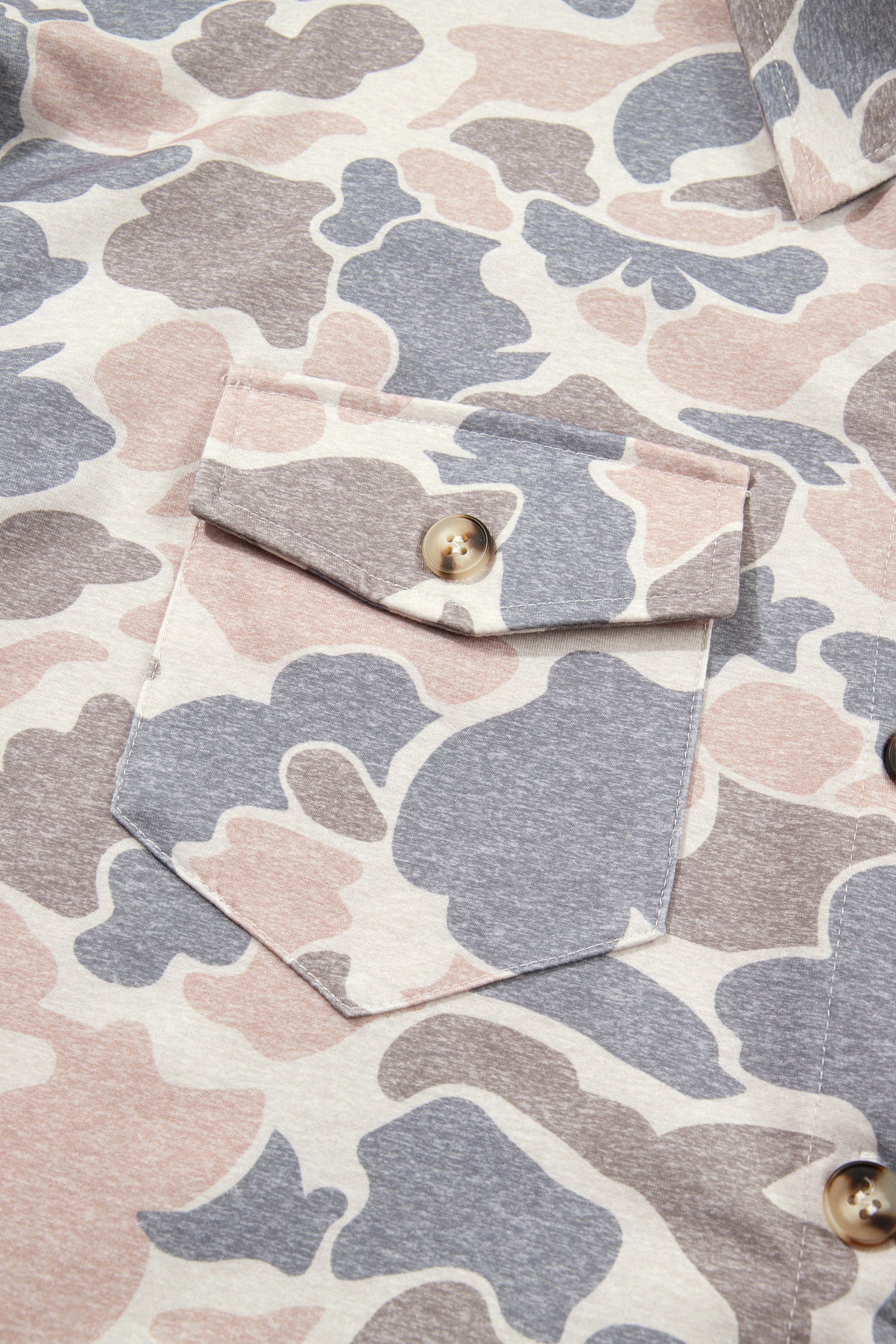 Pink camo shacket chest flap pocket with button closure