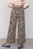 Camo print elastic waist wide leg jeans with back patch pockets, back view