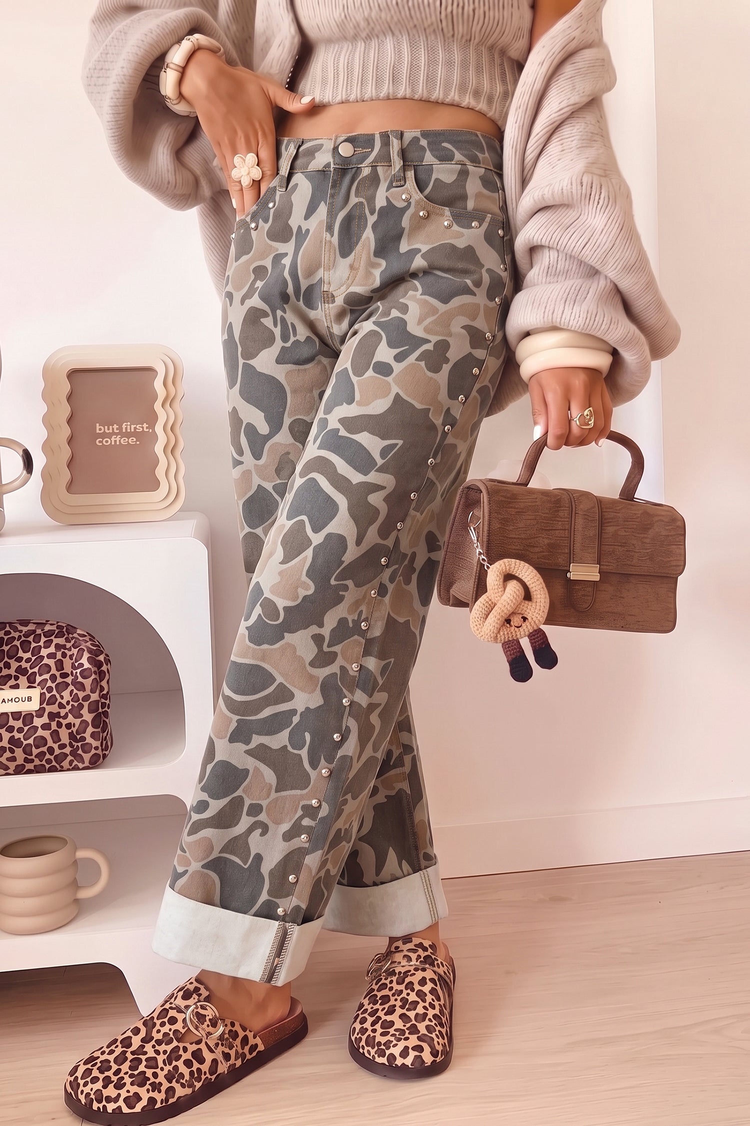 Women's camo studded high waist straight leg jeans with rolled cuffs, front view
