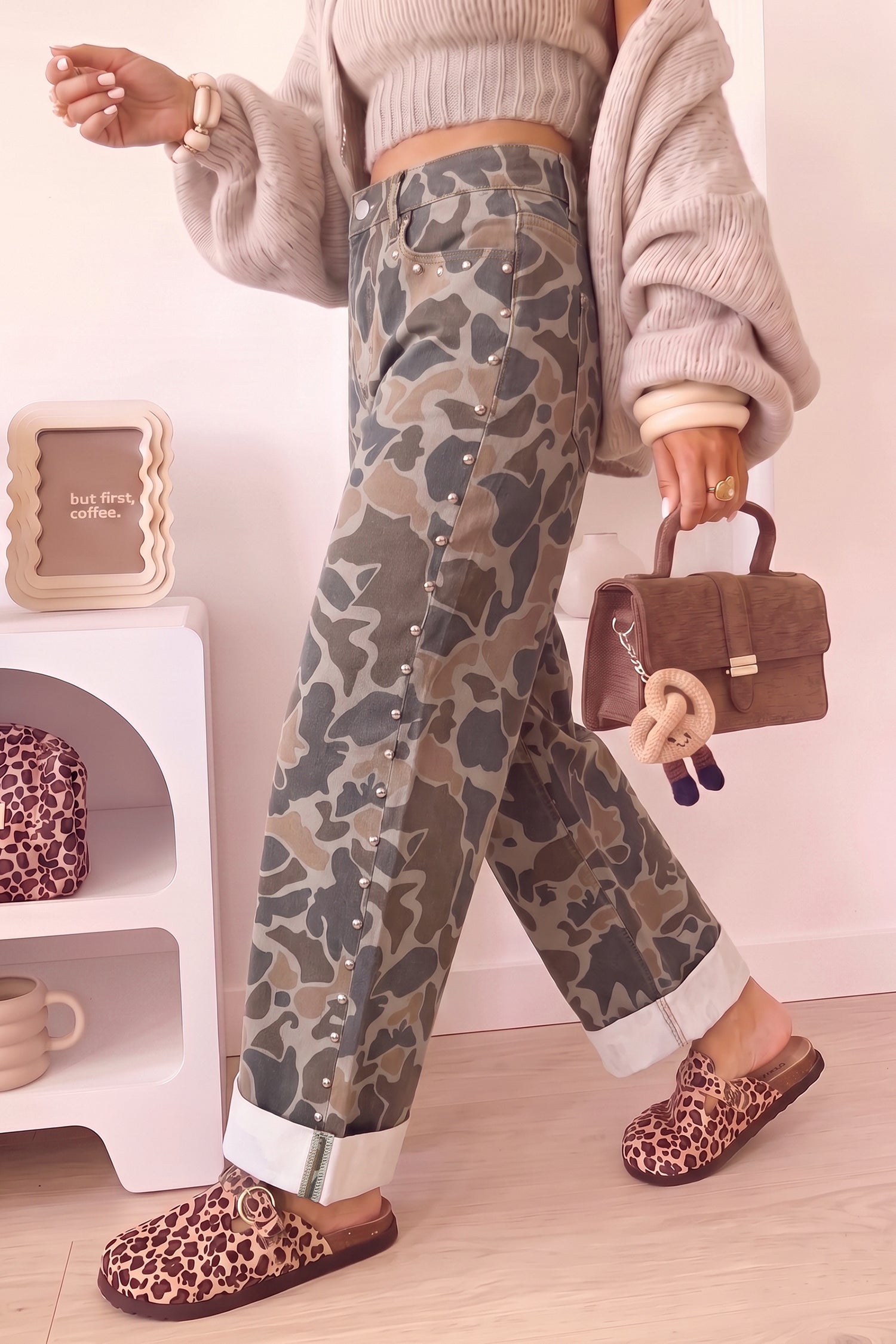 Camo print straight leg jeans with silver studs along the side seam, walking view