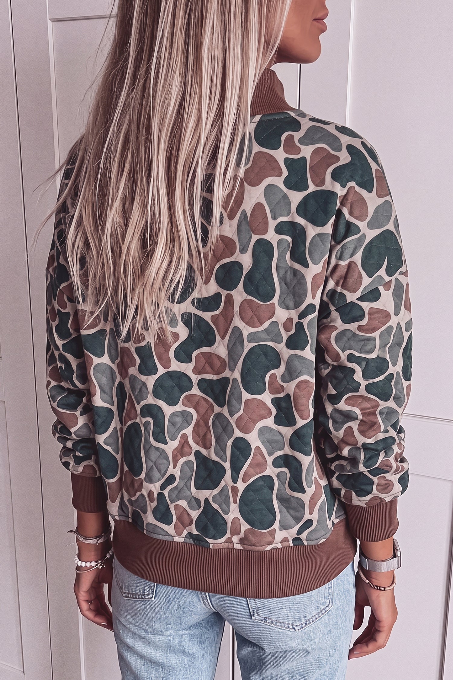 Camo print quilted sweatshirt, back view with ribbed hem and cuffs